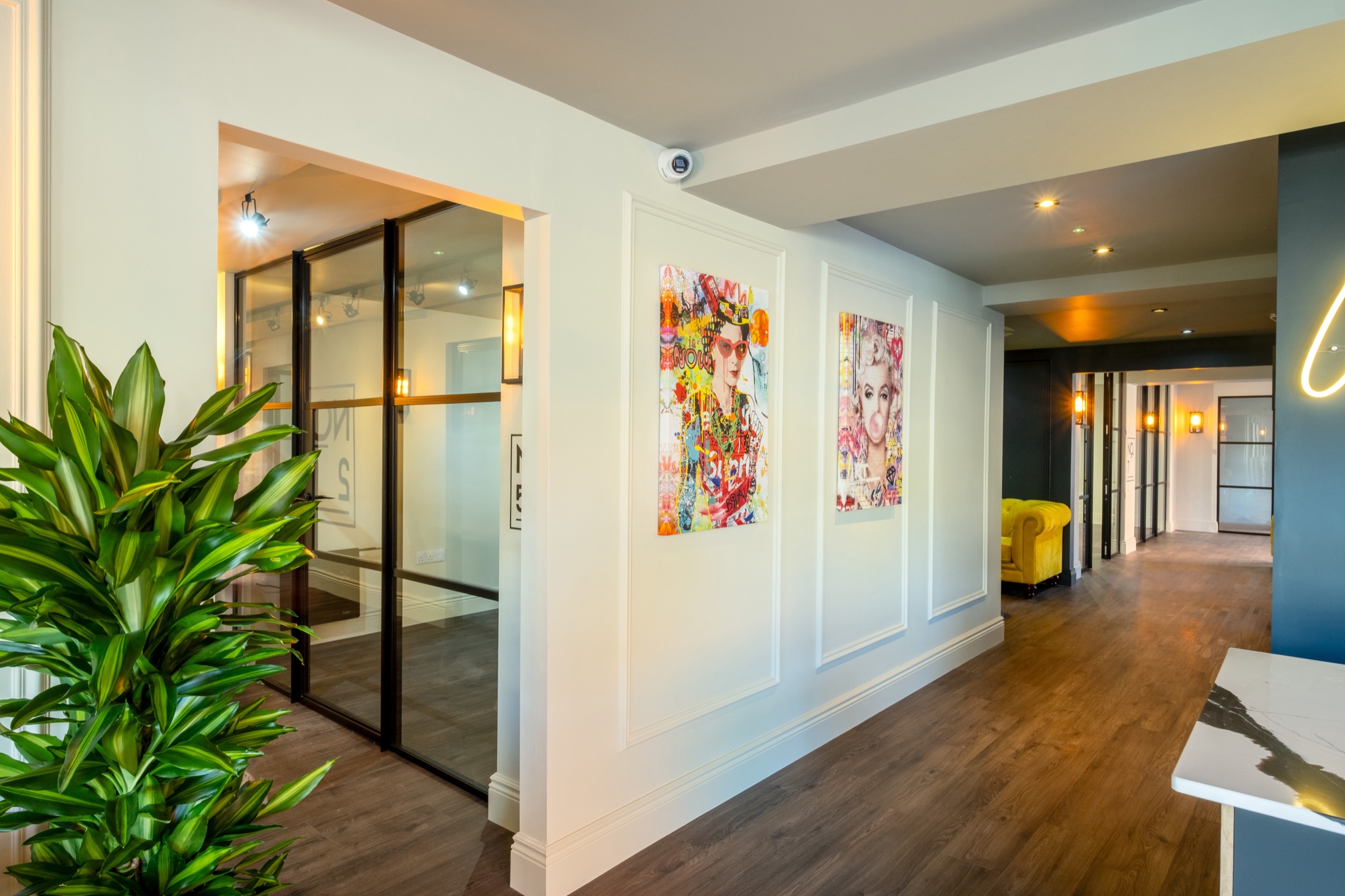 WorkLounge interior with private offices and artwork